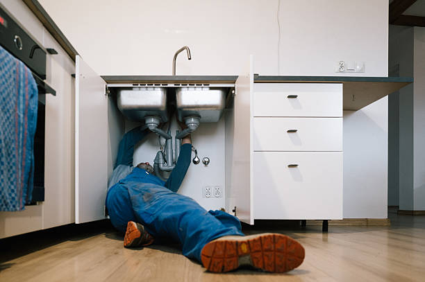 Professional Plumbing technician working in Clinton, AR